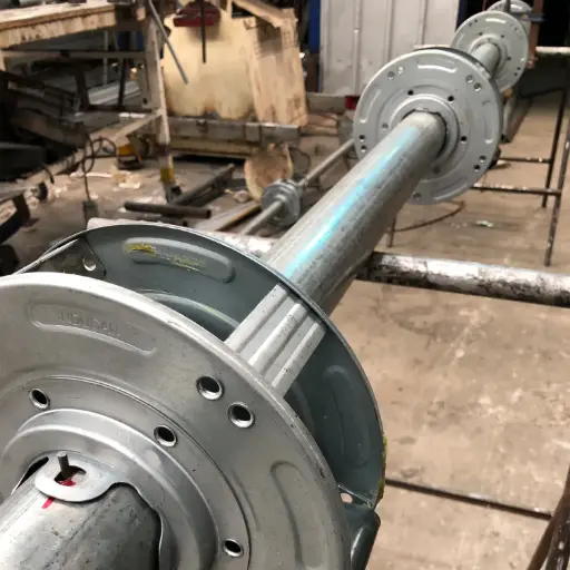 ENSAMBLE DE EJE MANUAL Puerta Enrollable